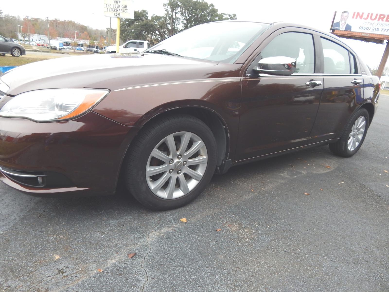 2013 Burgundy /Tan Leather Chrysler 200 Limited (1C3CCBCG3DN) with an 3.6L 6 Cyl. engine, Automatic transmission, located at 3120 W Tennessee St, Tallahassee, FL, 32304-1002, (850) 575-6702, 30.458841, -84.349648 - Used Car Supermarket is proud to present you with this loaded immaculate 2013 Chrysler 200 Limited with leather, sunroof and low miles. Used Car Supermarket prides itself in offering you the finest pre-owned vehicle in Tallahassee. Used Car Supermarket has been locally family owned and operated for - Photo #1